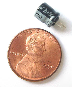 Mini radial electrolytic capacitor 68UF 16V (100) short