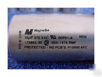 Five 30 microfarad motor run capacitors