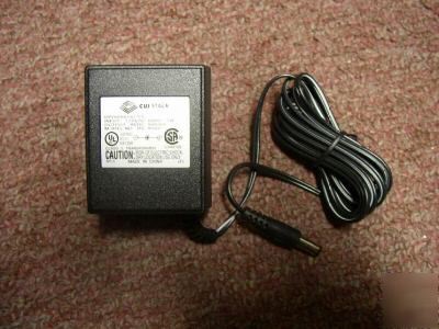 New wall adapter cui dv-9500 9VDC 500MA 